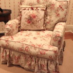 Red & Tan Chintz Slipcovered Club Chair With Needlepoint Throw Pillow
