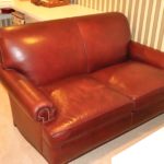 The Charles Stewart Company Designer Exclusive Rolled Arm Leather Loveseat Studding Detail