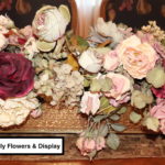 Faux Flower Arrangement In Oblong Table Centerpiece