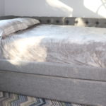 Large Full Size Trundle Bed With Tufted Back And Studding On Front Of Arm Includes Sleepy's Essential