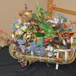 Faux Flower Arrangement With Metal Basket