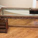 Intricately Carved Wood Coffee Table With Beveled Glass Top & Decorative Accessories