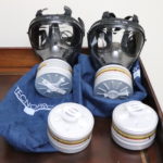 Pair Of Tecnopro SGE 150 Gas Masks With 4 Dråger Respirator Filters