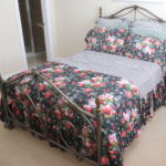 Full Size Ornate Metal Bed Frame With Serta Mattress And RALPH LAUREN Bedding