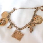 Gold Charm Bracelet With Assorted Charms Includes Cameo, Clover, Heart & More