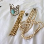 Women's Fashion Jewelry Lot Includes Gold Tone Ciner Bracelet, Cuff Bracelet & Faux Pearl Strand