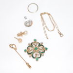 Women's Jewelry Lot Includes 14KT Gold Pin With Green Stones, Heart Pin, Gold Chain & Hebrew Pendant