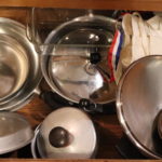 Draw Full Of Assorted Pots, Pans, And Lids