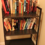 Lot Of Books By James Patterson & Other Authors With Metal Bookcase